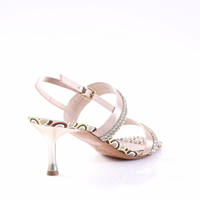 Pink strappy high-heeled sandal with rhinestone embellishments and a multicolored patterned sole on the heel edge.