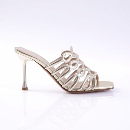 Gold metallic strappy high-heeled sandal with a slender stiletto heel, open toe design.