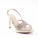 Gold high-heeled sandal with rhinestone-embellished front straps and an ankle buckle, open toe