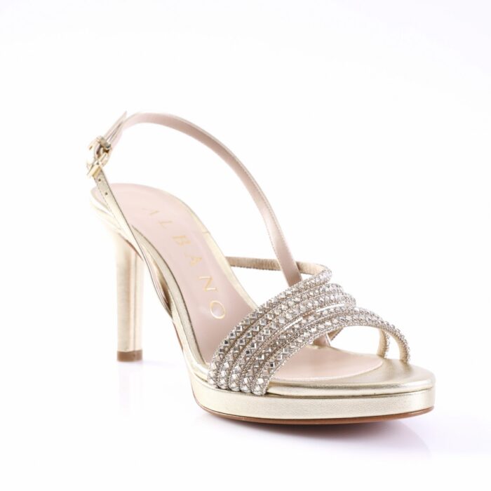 Gold high-heeled sandal with rhinestone-embellished front straps and an ankle buckle, open toe