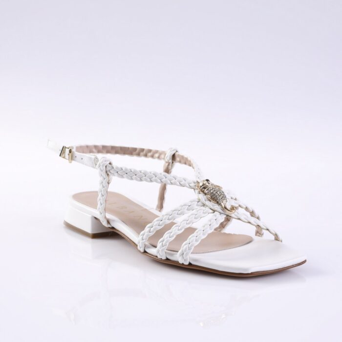 White braided-straps sandal with a small block heel and rhinestone centerpiece across the top strap