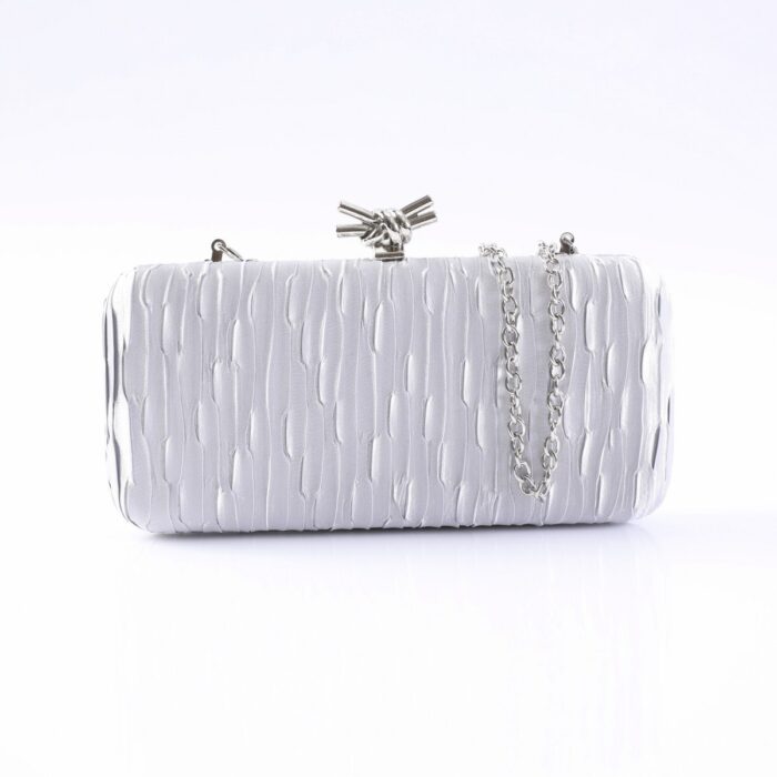 Silver textured clutch with a knot clasp and silver chain strap