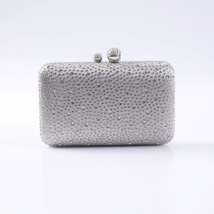 Silver clutch purse covered in small rhinestones with a two-ball clasp on top.