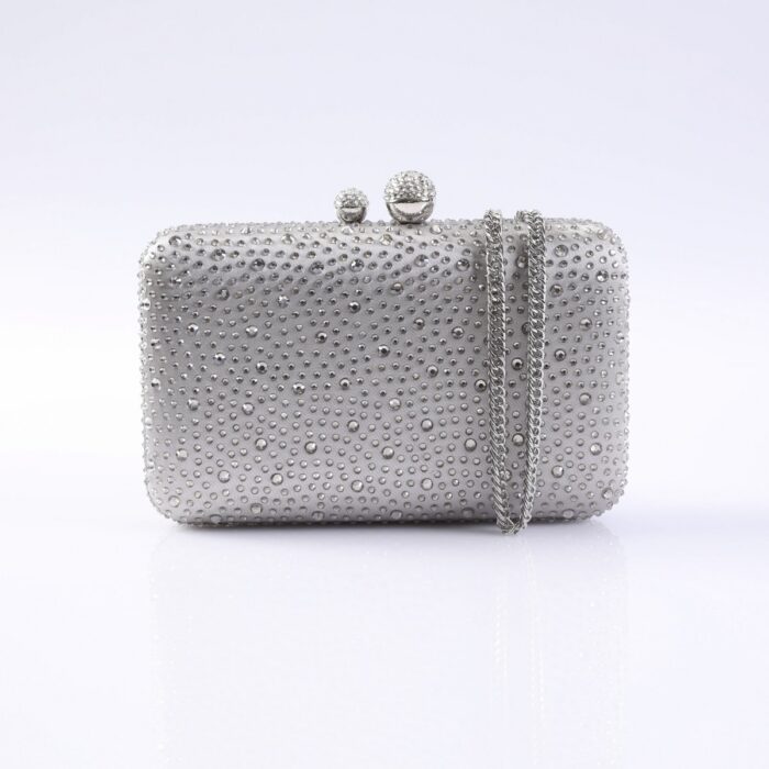 Silver evening clutch covered in tiny rhinestones with a round ball clasp and chain strap.