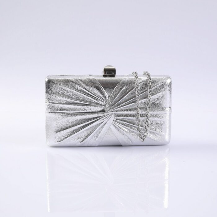 Silver rectangular evening clutch with a radial pleated design and a silver chain strap on a reflective surface
