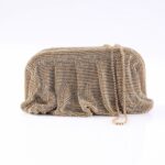 Gold-toned beaded clutch purse with a gathered, draped exterior and a thin chain strap for evening wear