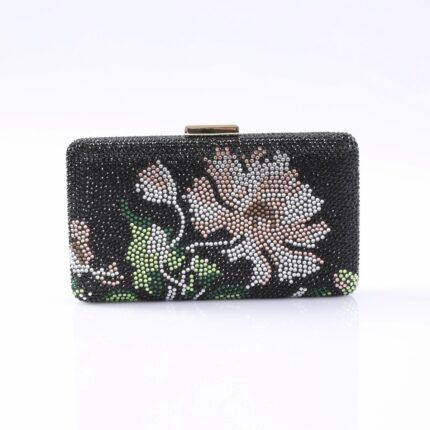 Beaded black clutch with pink and white floral pattern and a gold clasp.