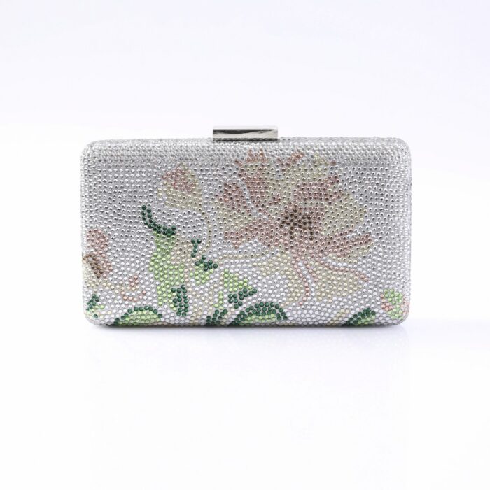 Silver beaded clutch bag with a subtle pink and green floral design and a metal clasp.
