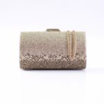 Gold-toned beaded clutch purse covered in rhinestones with a gold chain strap