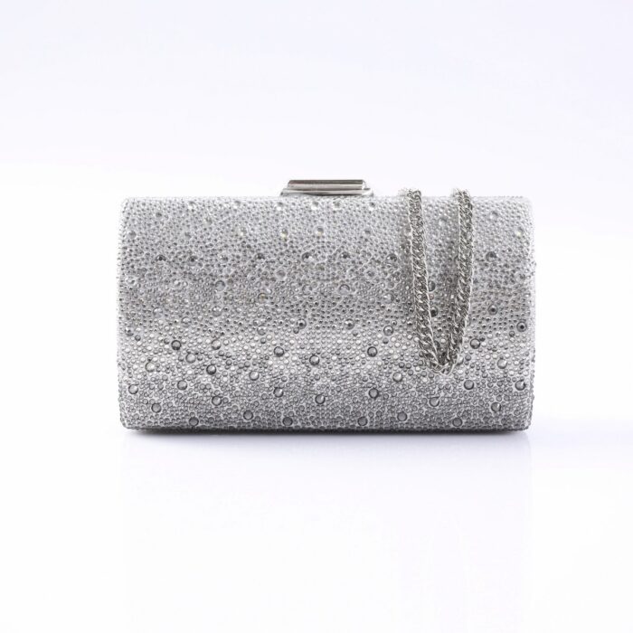 Silver rhinestone-covered clutch bag with a silver chain strap, photographed against a white background