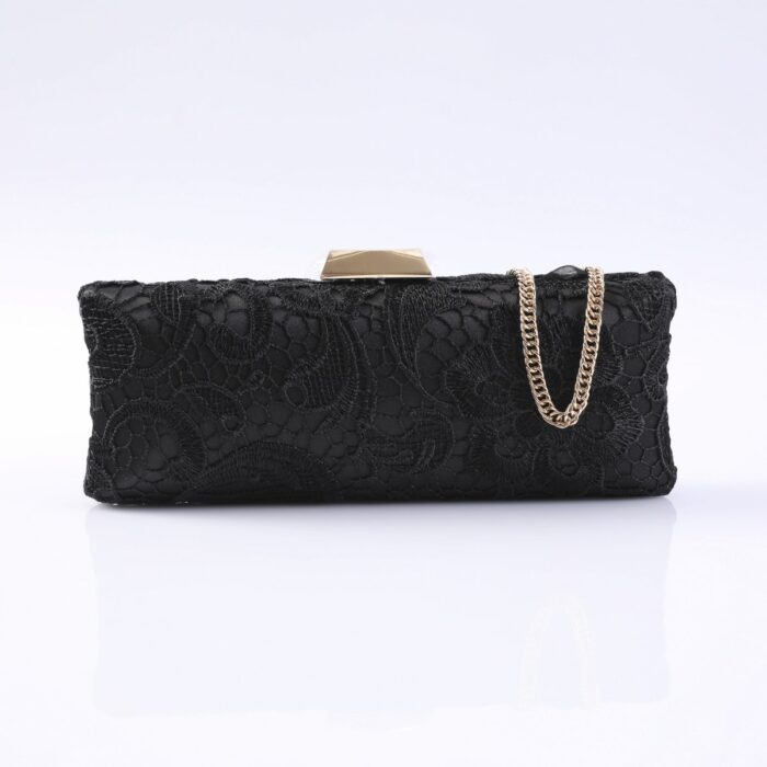 Black lace evening clutch with a gold-toned chain strap and angular clasp on a white reflective surface