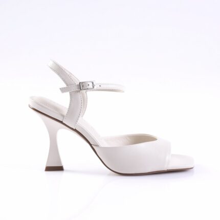 White open-toe sandal with an ankle strap and a sculpted curved heel against a white background.