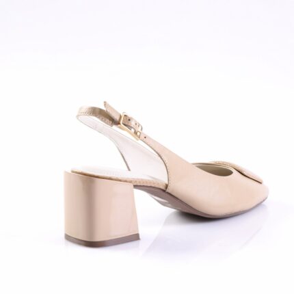 Beige leather slingback pump with a chunky block heel and ankle strap buckle.