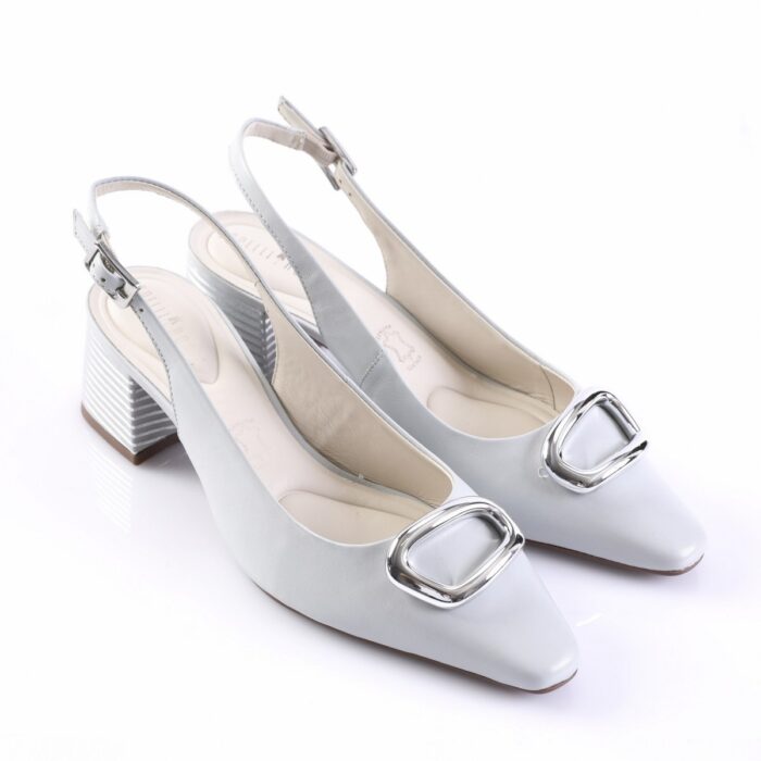 Two light-blue slingback pumps with pointed toes, silver-tone buckle on the vamp, and a striped block heel set on a white background