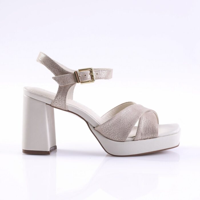 Silver-beige strappy sandal with a chunky block heel and gold buckle, shown in profile.