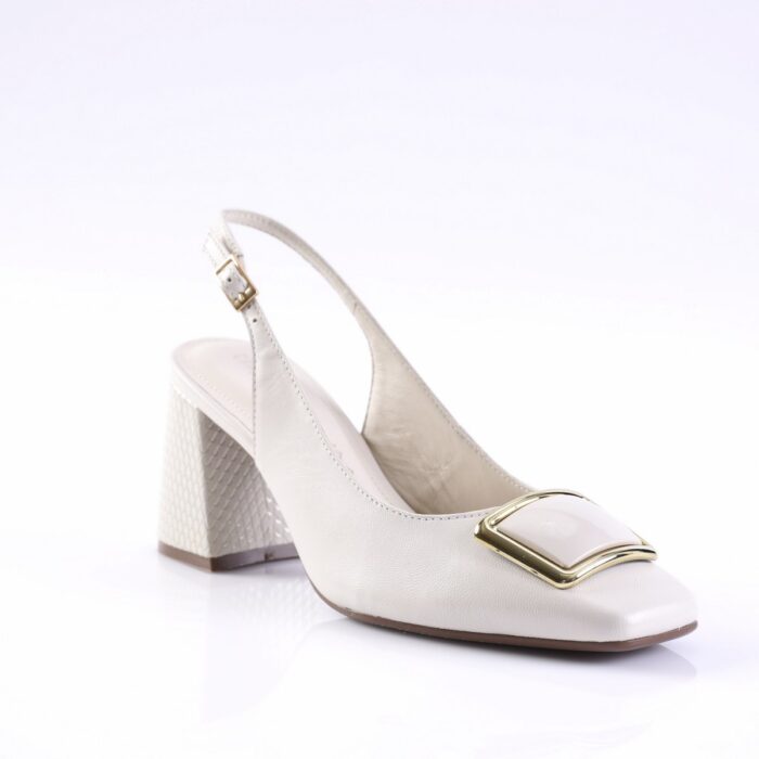 Cream slingback heel with a gold buckle and a chunky textured heel on a white background