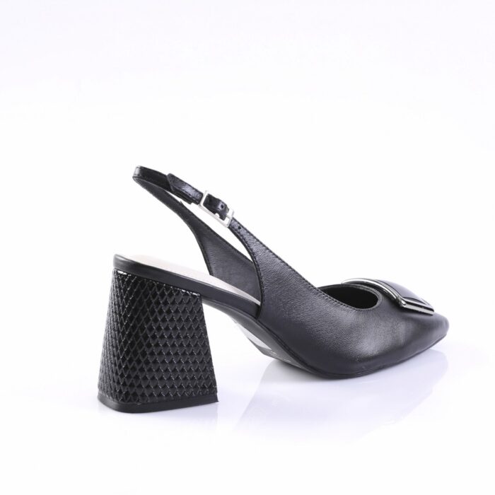 Black leather slingback pump with a textured, block heel and silver buckle strap over the vamp