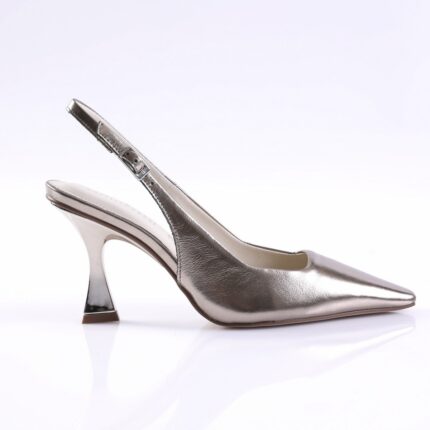 Metallic silver slingback pump with pointed toe and sculpted curved heel on a white backdrop