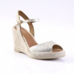 Silver open-toe wedge sandal with ankle strap and braided rope sole