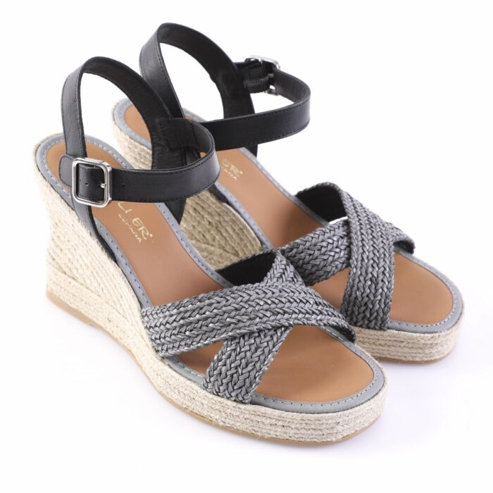 Grey woven espadrille wedge sandals with black ankle straps and buckled closure, open toes.