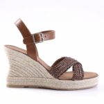 Brown leather ankle-strap wedge sandal with braided front straps and a rope-wrapped espadrille heel.