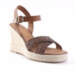 Brown woven-strap wedge sandal with an ankle buckle on a braided jute espadrille heel