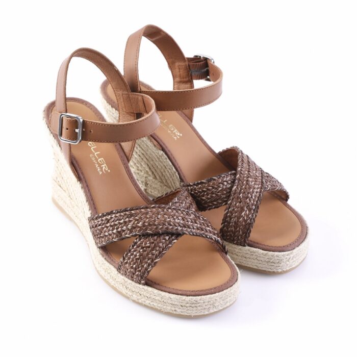 Brown braided-strap espadrille wedge sandals with ankle straps against a white background (women's casual footwear).