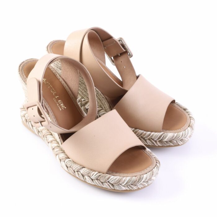 Beige open-toe espadrille wedge sandals with braided rope sole and ankle buckle.
