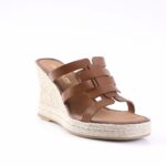 Brown leather wedge sandal with braided jute heel and three straps across the top, open toe.