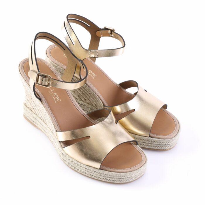 Gold metallic espadrille wedge sandals with ankle straps and braided jute sole, standing side by side for display.