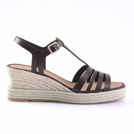 Black strappy wedge sandal with a braided jute platform and ankle buckle detail.