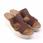Brown woven-strap espadrille sandals with rope-wrapped wedge heel and open toe