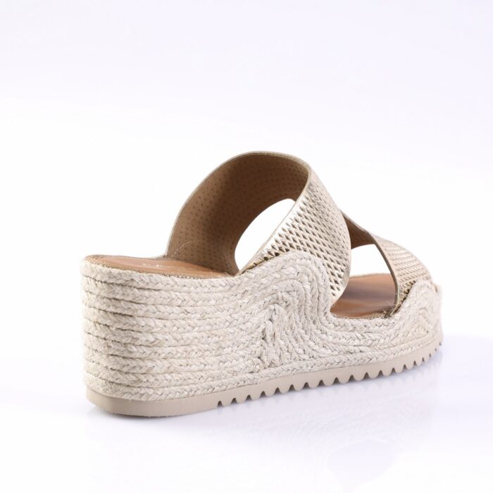 Beige espadrille wedge sandal with a braided jute sole and metallic straps, shown from the side.