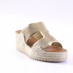 Gold metallic wedge sandal with perforated upper and braided jute sole.