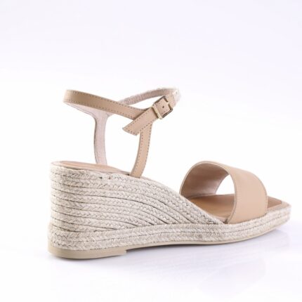Beige espadrille wedge sandal with ankle strap and buckle on a rope-wrapped sole (women's summer footwear).