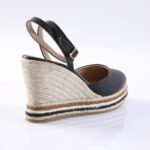 Black leather wedge sandal with an ankle strap and natural rope espadrille heel.