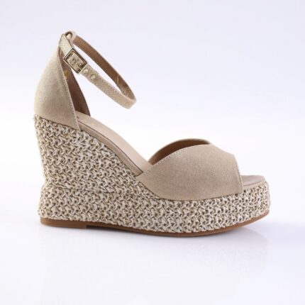 Beige espadrille wedge sandal with braided jute sole and ankle strap, side view