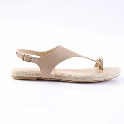Beige leather sandal with a toe post and ankle buckle on a woven espadrille sole against a white background.