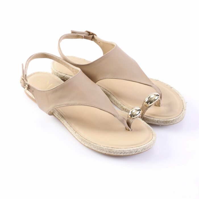 Beige leather thong sandals with ankle straps and gold-toned bead accents on the toe posts.
