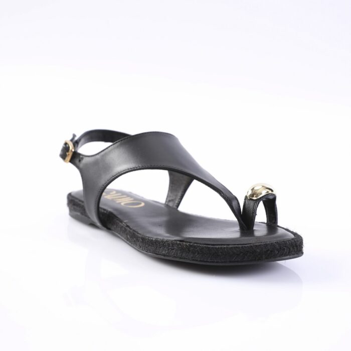 Black leather thong sandal with ankle strap and a gold-toned knob at the toe loop.