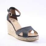 Navy wedge espadrille sandal with ankle strap, gold buckle, and stitched navy leather upper.