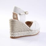 White espadrille wedge sandal with braided jute sole and ankle strap