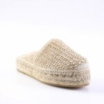 Beige woven espadrille with a braided rope sole, viewed from the front-left side.
