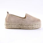 Beige suede espadrille shoe with a thick rope-wrapped platform and natural jute trim on the sole.