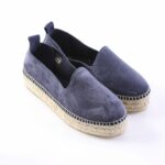 Navy blue suede espadrille flats with a rope-wrapped sole, pair shown from a side angle