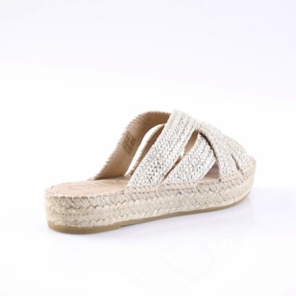 Cream woven espadrille sandal with braided jute sole and crisscross straps (side view)