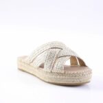 Beige espadrille sandal with silver braided straps and a woven jute sole.