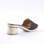 Brown open-toe espadrille sandal with a braided rope block heel on a white studio background