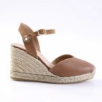 Brown leather espadrille wedge sandal with an ankle strap and braided jute sole.