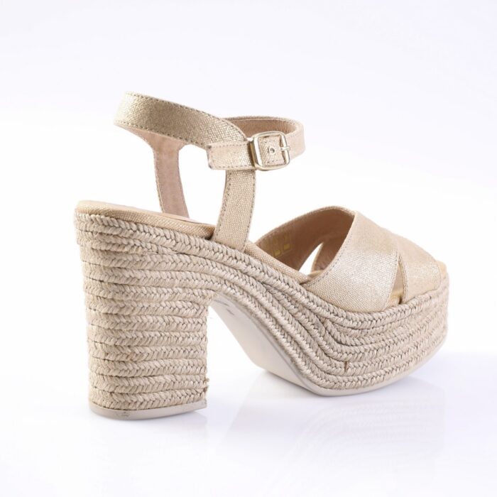 Beige strappy wedge sandal with a braided rope heel and ankle strap with buckle.